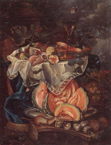 Still life of grapes,sweet breads and a glass of wine upon a gilt tazza,set upon a table draped with a blue rug,together with figs and peaches,beneath